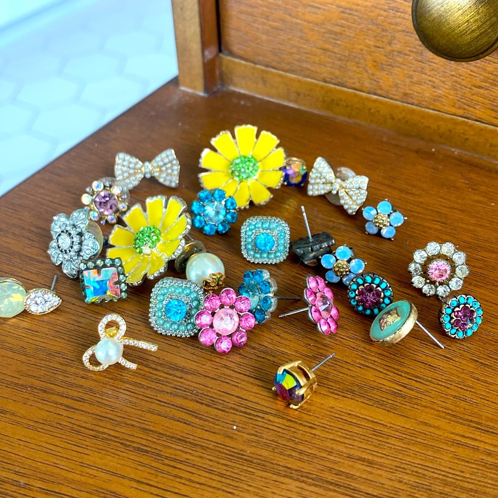 Lot of mixmatched earrings.